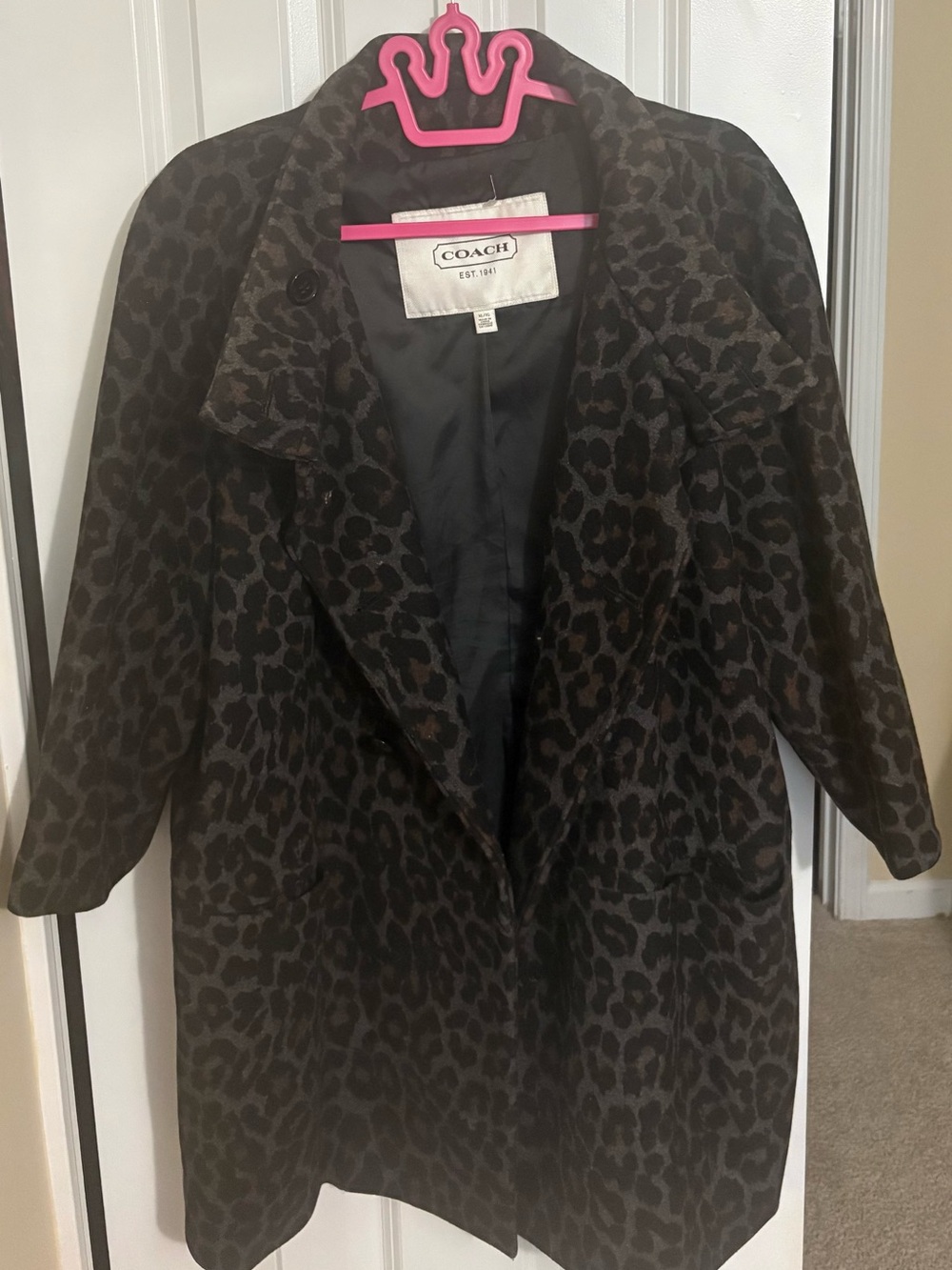 Like New Great Condition Coach Black wool coat with Cheetah print.